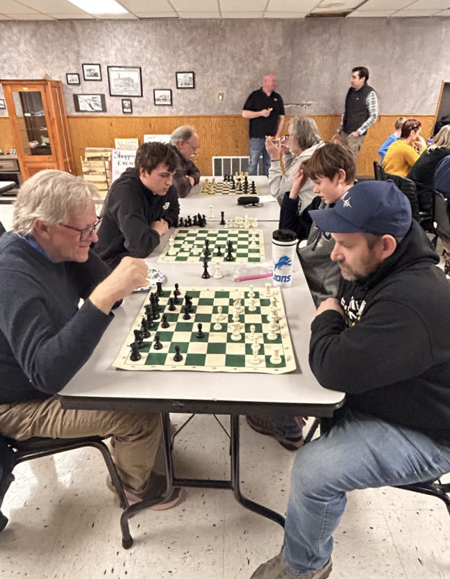 members playing chess at the Eagles Club